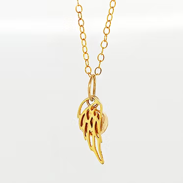 14kt gold-filled cremation pendant with ash and crushed opal inlay. 6mm pendant. Includes a gold angel wing with opal inlay and ash.