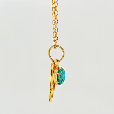 14kt gold-filled cremation pendant with ash and crushed opal inlay. 6mm pendant. Includes a gold angel wing with opal inlay and ash.