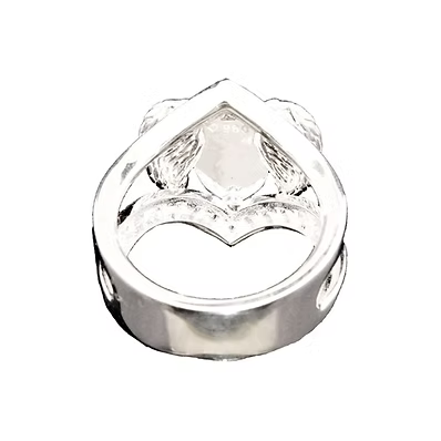 A silver-toned ring featuring a central clear heart-shaped gemstone surrounded by small clear stones, set in a polished metal band on a plain white background.