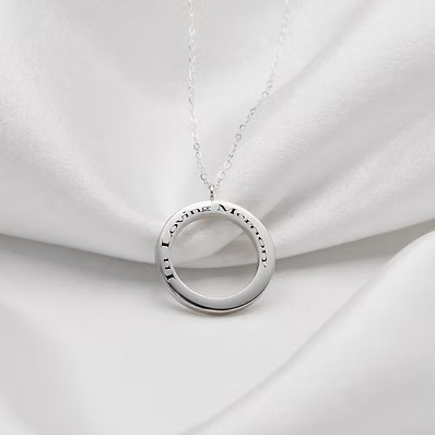Bck view of the Cremation Circle Pendant Argentium Silver .960 with engraving 