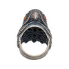 A gothic-style silver ring shaped like a bird's head with textured detailing and small red gemstone eyes, shown against a plain white background.
