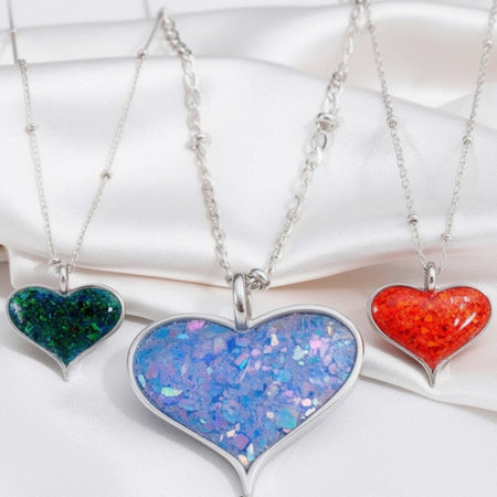 Cremation Large Heart Pendant .960 Silver on White Silk Background