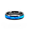 A custom black metal band ring featuring a vibrant blue opal inlay, with 'Your Text Here' engraved on the inside, shown on a plain white background.