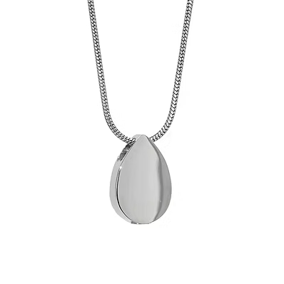 A polished silver teardrop-shaped locket pendant on a matching silver chain, shown against a plain white background.