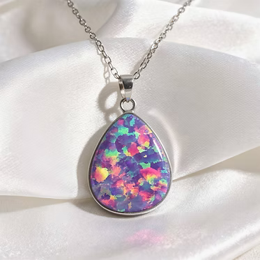 .960 Argentium silver pear shaped pendant with chain and opal inlay