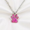 paw print silver with silver chain. Opal inlay
