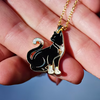 gold cat pendant with opal inlay and chain