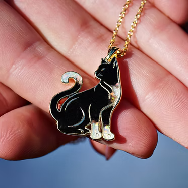 gold cat pendant with opal inlay and chain