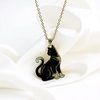 gold cat pendant with opal inlay