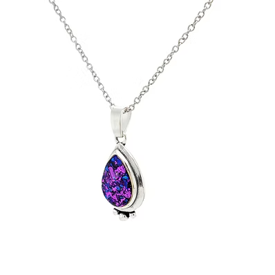 a large pear shaped pendant in .960 silver with chain and custom opal inlay on white background