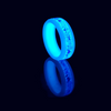 White ceramic ring glowing in the dark